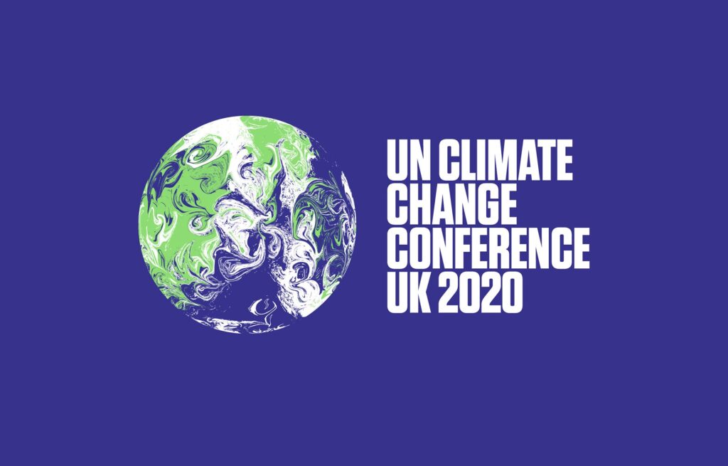 Ilustração do planeta terra. Escrito ao lado: UN Climate Change Conference UK 2020