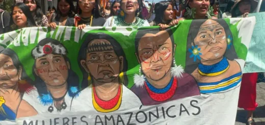 Female environmental defenders march on Aug. 21 in Puyo, Ecuador, calling on governments to respect their rights and the rights of nature. Credit: Katie Surma/Inside Climate News.
